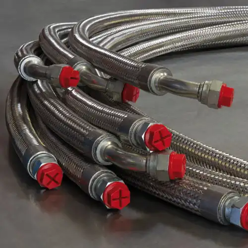 ::<h3>Distributor of hydraulic hoses</h3> <h3> Complete range of hydraulic fittings</h3> <h3>Manufacturing of secure hydraulic hoses</h3> <h3> Protective sleeves</h3> <h3> Extrusion of pneumatic tubes</h3> <h3> Thermoplastic preforms</h3> Tecalemit Flexibles
